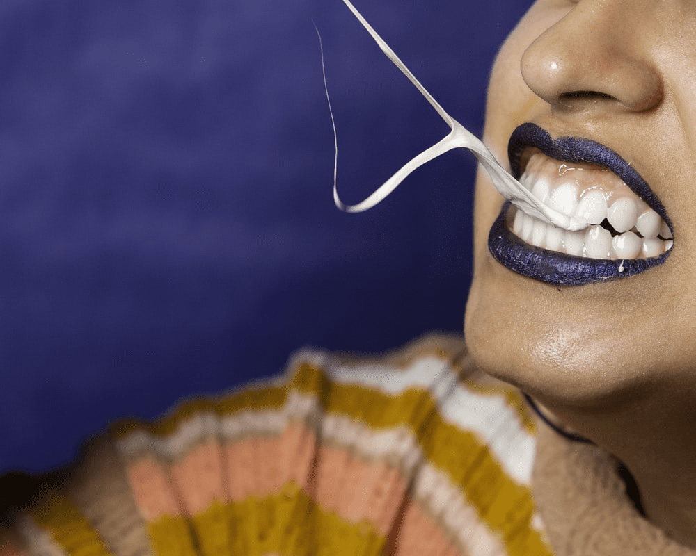 A person’s mouth dental chewing gum